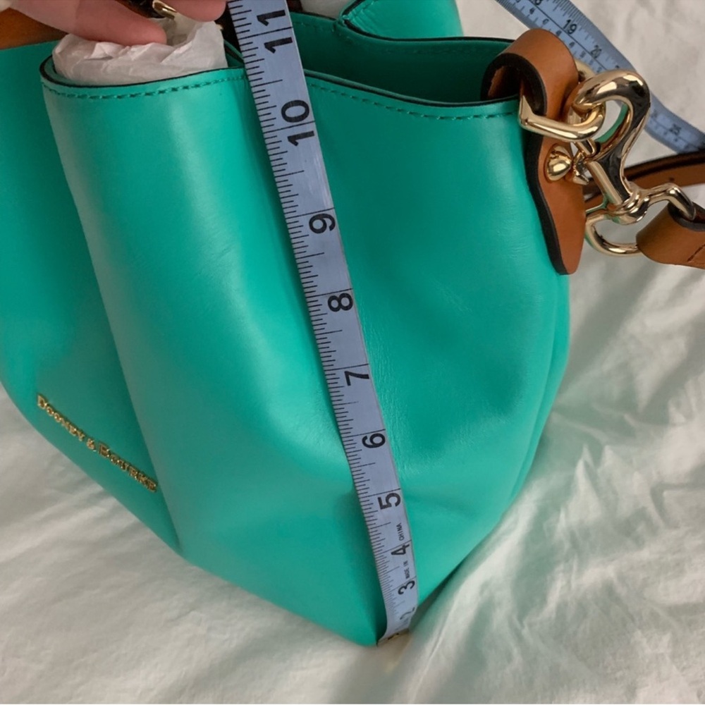 Dooney & Bourke southwest Turquoise Barlow purse
Like New !!!!!! SALE!!!!!!! - Picture 10 of 11